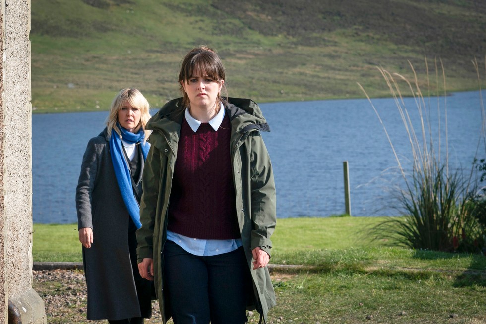 Shetland Tosh storming away from Ruth by a lake